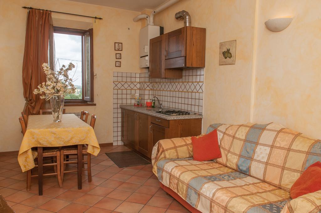 Residenza Il Palazzo Apartment Кастильоне дел Лаго Стая снимка