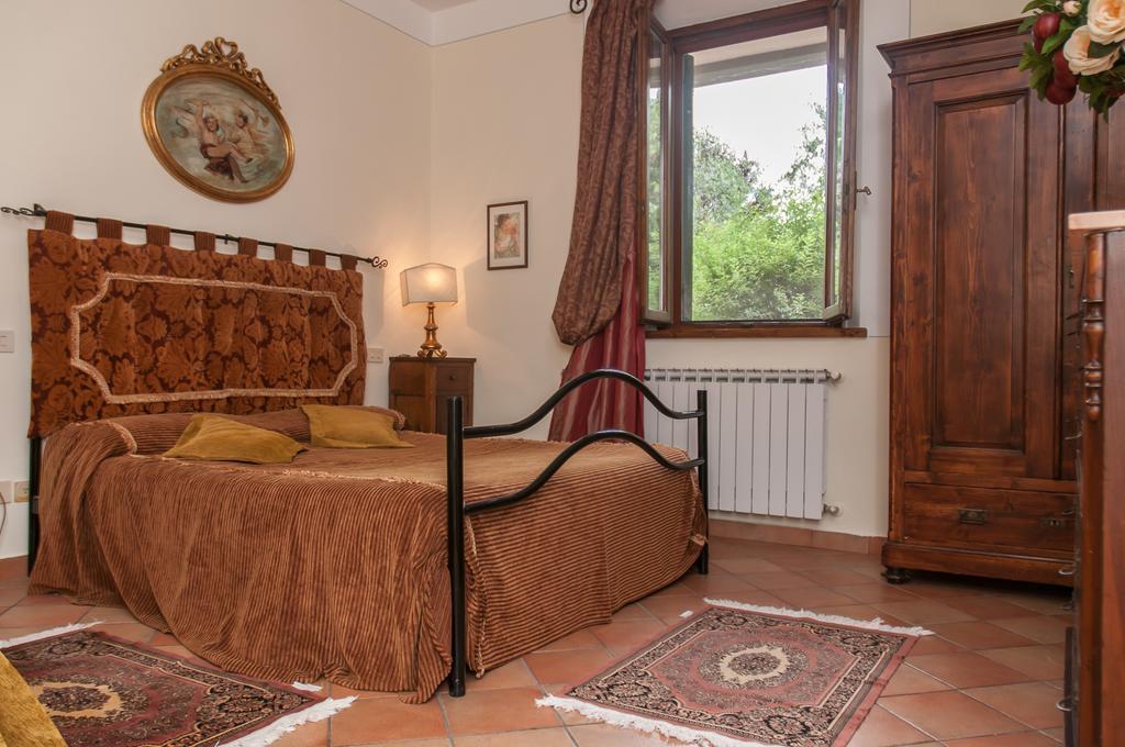 Residenza Il Palazzo Apartment Кастильоне дел Лаго Стая снимка